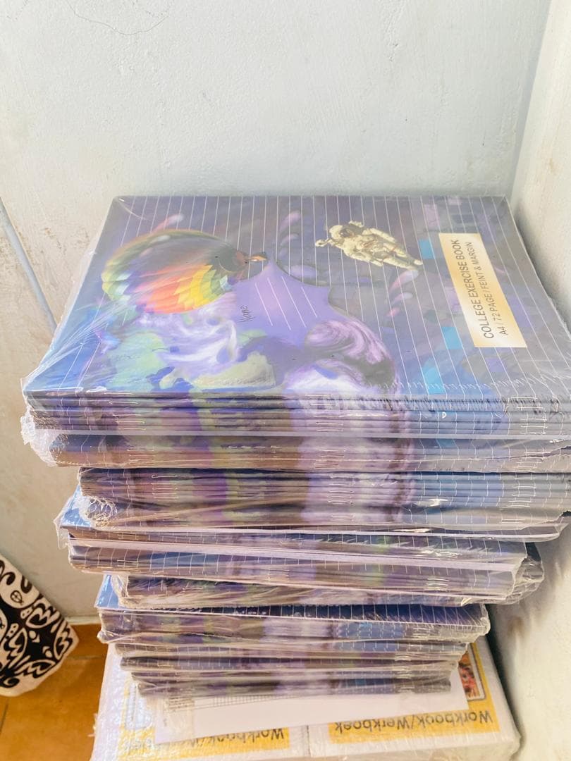 Exercise books and school supplies ready for distribution to students by MOVSC